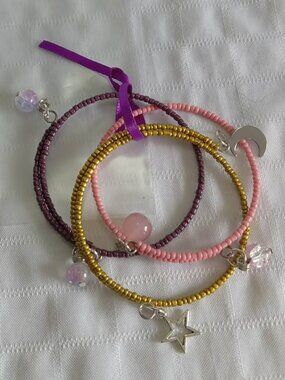 J - Handmade memory wire bracelets set with beads and pendants